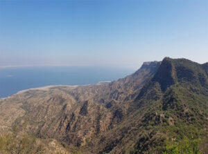Panoramic mountain landscape from Kalam Dungar viewpoint overlooking rugged terrain and distant horizon